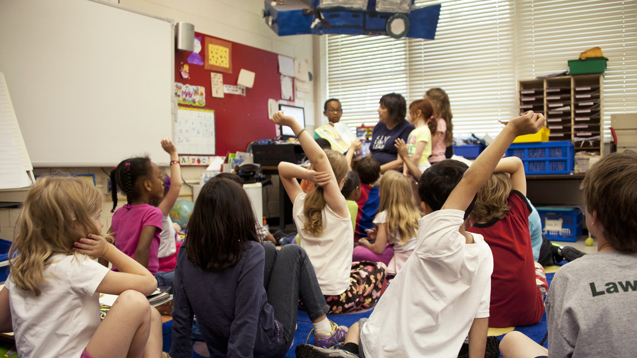 children listening to teacher read